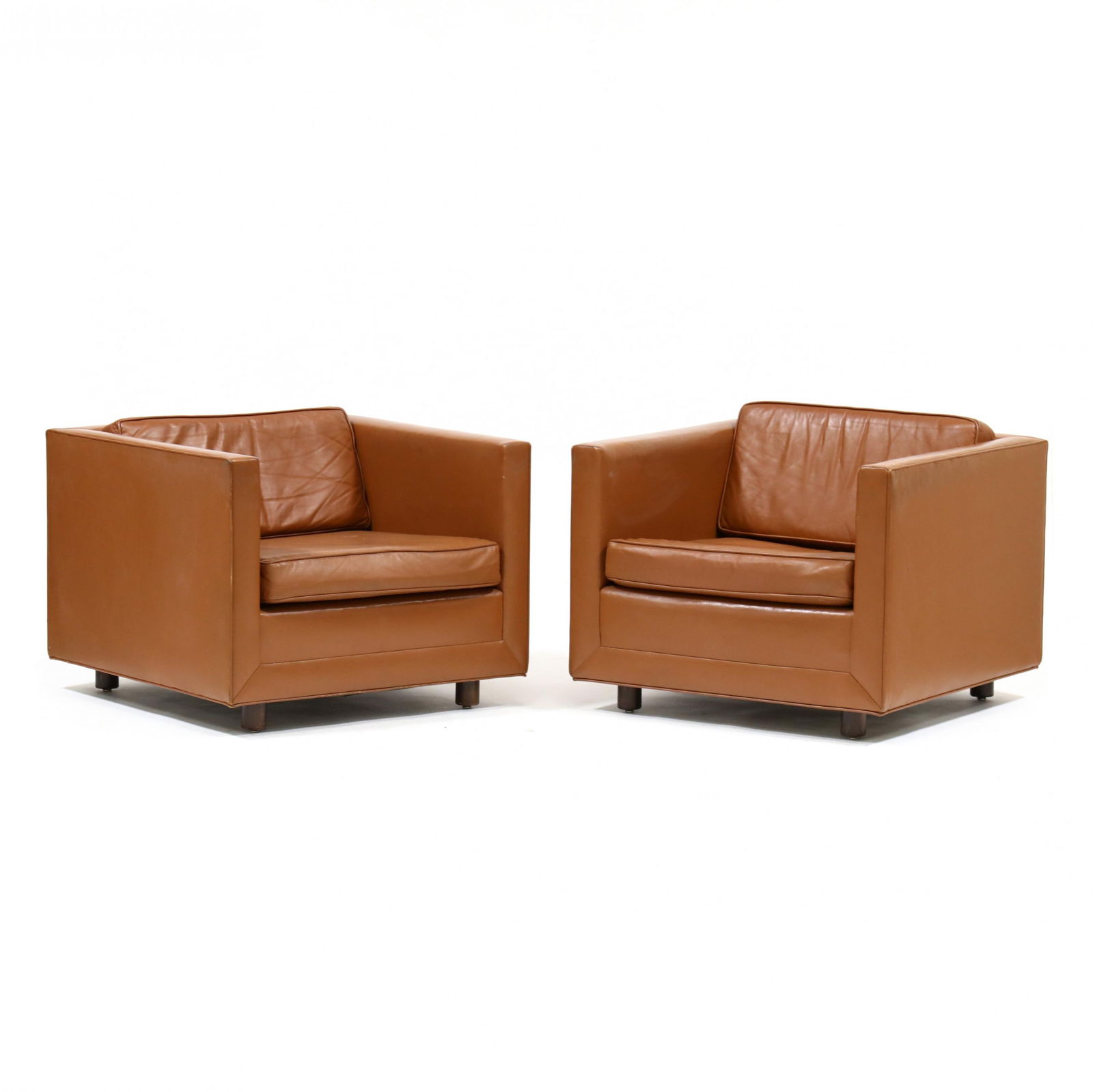 Ward Bennett (American, 1917-2003), Pair of Straight Line Series Leather Club Chairs: Ward Bennett (American, 1917-2003), Pair of Straight Line Series Leather Club Chairscirca 1989, labeled, turned wood recessed feet. 25.5 x 33.25 x 33 in. Additional high-resolution photos are availab