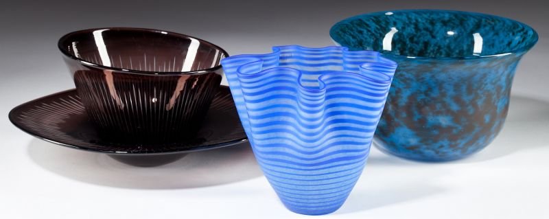Three Kosta Boda Art Glass Bowls: Three Kosta Boda Art Glass Bowlsthe first is a blue mottled bowl by Bertil Vallien (Swedish, b. 1938), signed "B Vallien, Boda-Afors" to base (3.75 x 6.75 in.); the second is a free-form blue striped