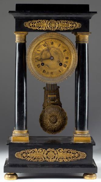 French Empire Portico Mantel Clock: French Empire Portico Mantel Clock19th century, black marble with gilt brass mounts, unsigned time and strike brass movement, serial number 1145, "'35 - 10 - 103" painted on the back.17.5 in.