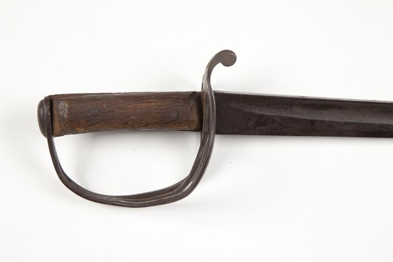 Confederate Georgia Altered Cavalry Saber: Confederate Georgia Altered Cavalry Saber marked ISAAC & CO. on the top edge of the single fuller blade, additionally stamped with a large "G" just below the ricasso, topped with a single piece iron g