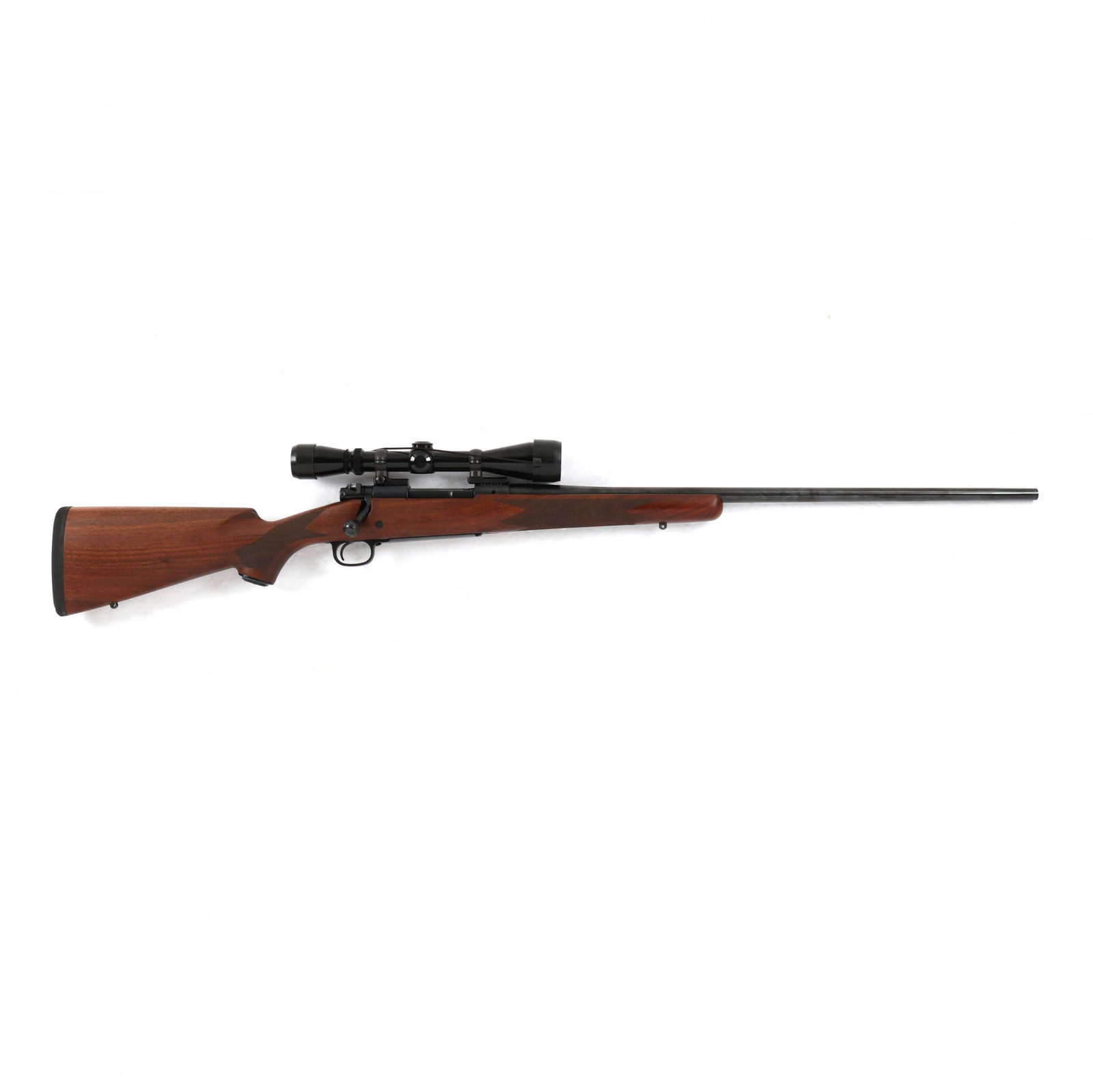 Winchester .300 Model 70 Bolt Action Rifle with Scope: Winchester .300 Model 70 Bolt Action Rifle with Scopeserial number G312748 on receiver, 25 3/5 in. blued barrel marked WINCHESTER / MODEL 70 / .300 WIN. MAG. / MADE IN NEW HAVEN, CT., U.S.A. with LEUP