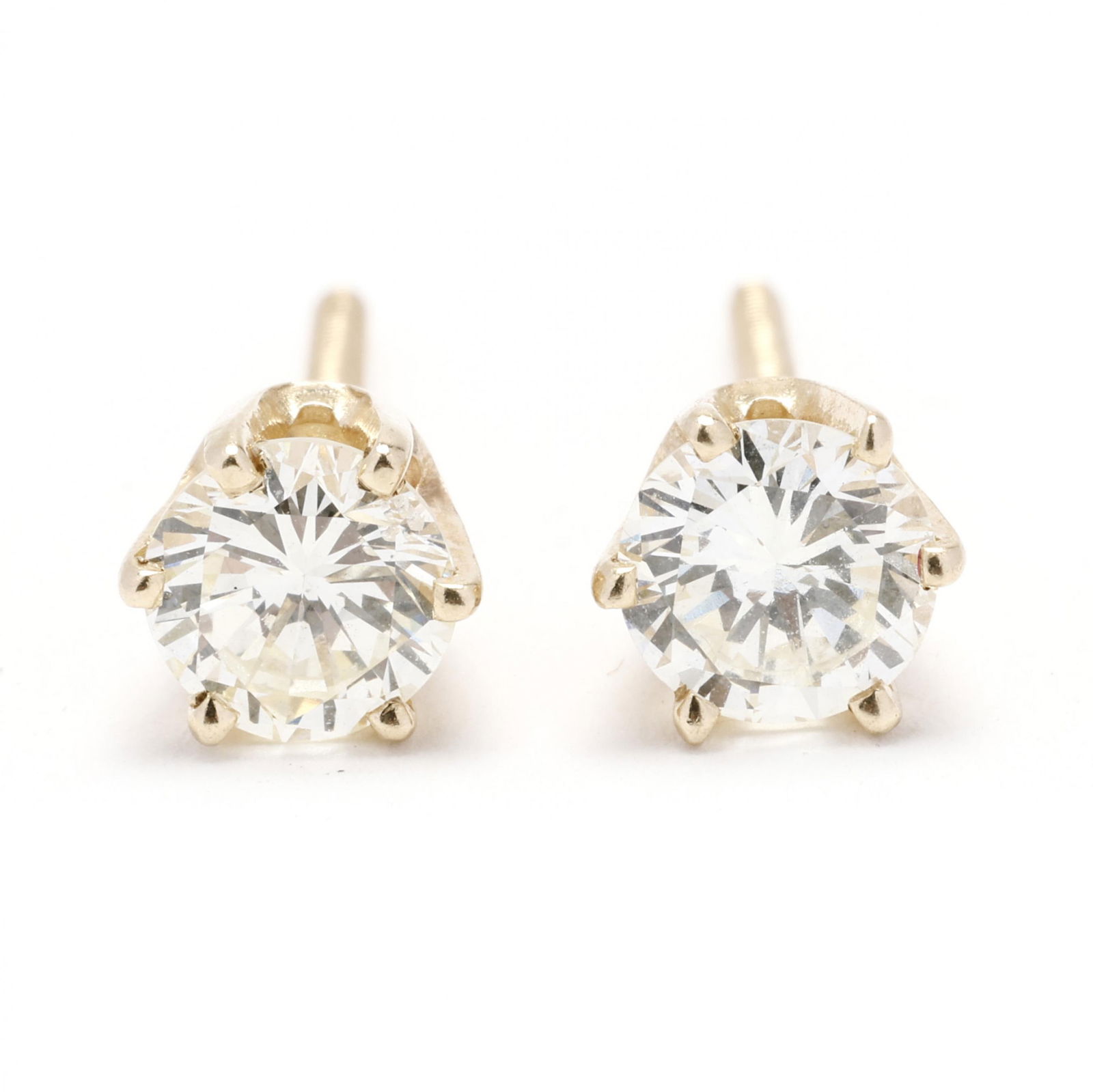 Gold and Diamond Stud Earrings: Gold and Diamond Stud Earringsset with full cut round diamonds (5.0mm; 5.2mm) weighing approximately 1.0 total carat (M-N color, SI1-SI2 clarity), with screw posts and backs, testing 14KT. .9 total dw