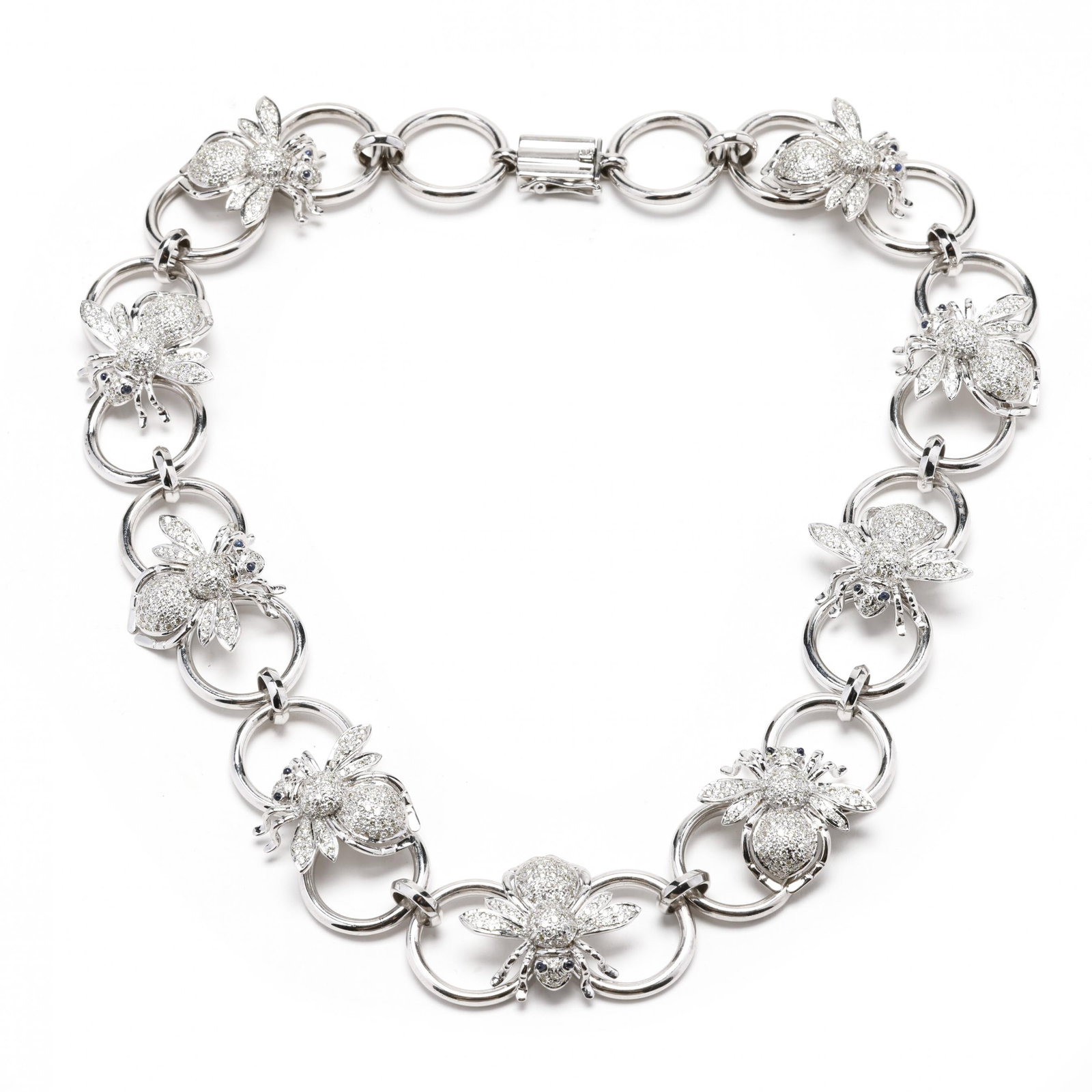 White Gold, Diamond, and Sapphire Bee Necklace: White Gold, Diamond, and Sapphire Bee Necklace with repeating round link and bumble bee motif, bees set with full cut round diamonds weighing approximately 6.3 total carats (O-P color, SI1-SI2 clarity