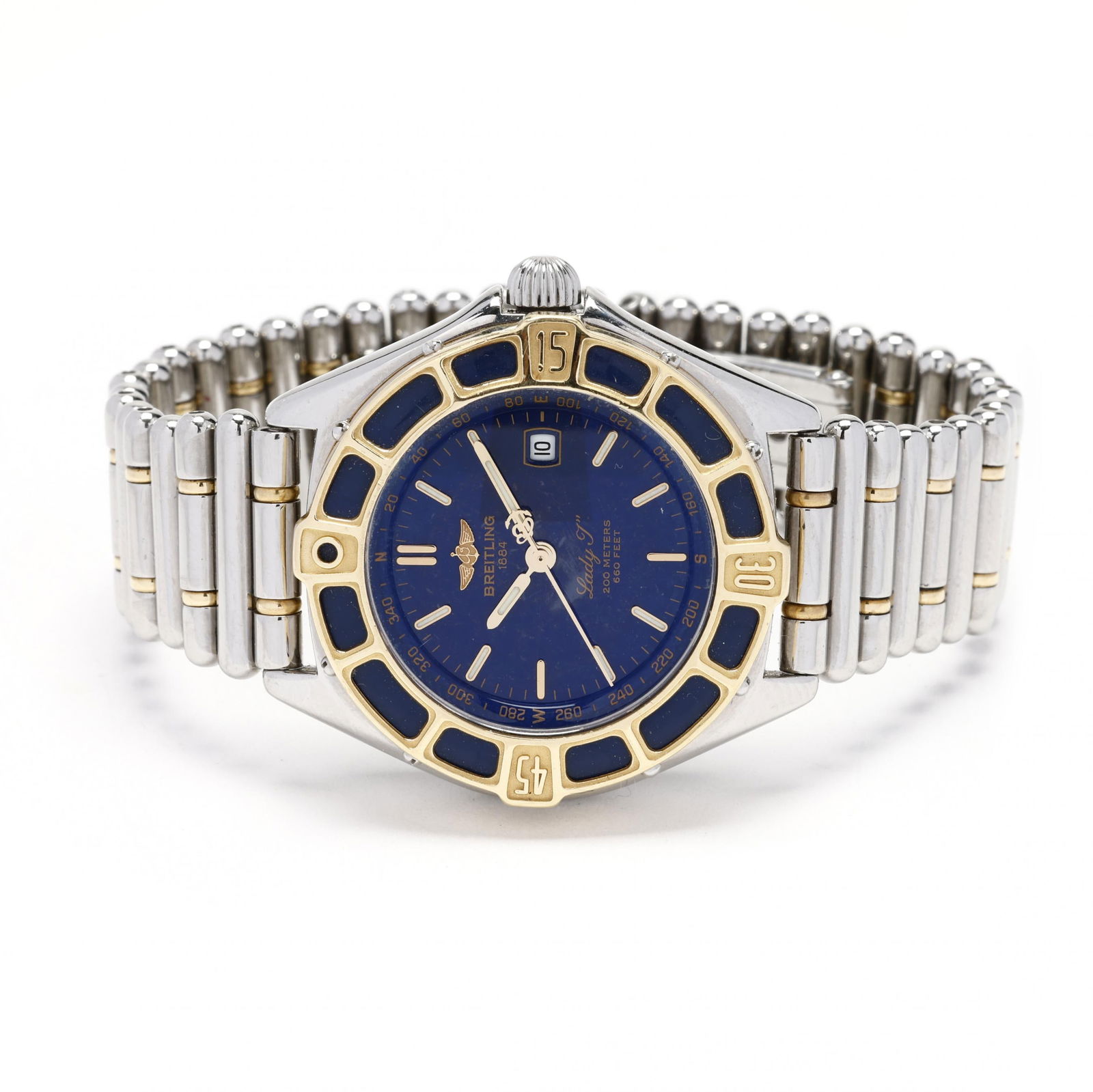 Lady's Stainless Steel and Gold Lady J Watch, Breitling: Lady's Stainless Steel and Gold Lady J Watch, Breitlingquartz, the stainless steel case with signed unidirectional rotating yellow metal and blue enamel bezel, the signed blue dial with luminescent ba