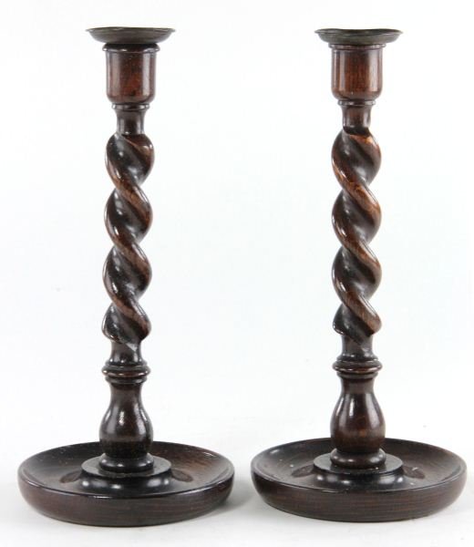 Pair of English Barley Twist Candlesticks: Pair of English Barley Twist Candlesticks circa 1900, oak, brass bobeche. 12 x 5.5 in. diameter