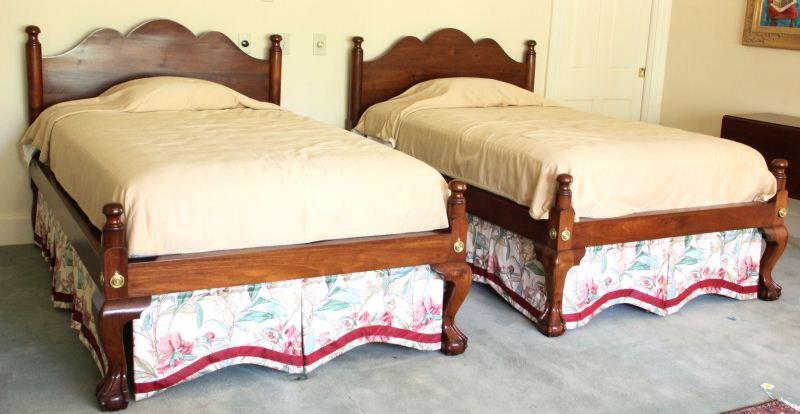 Pair of Walnut Beds by Hart Wiggins: Pair of Walnut Beds by Hart Wigginscustom made, 3/4 size, scalloped headboard with mushroom finial posts, low foot rail with finials and ball and claw feet. 44 x 52 x 80 in.; mattress width 47 in.; he