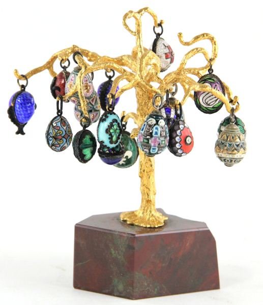 Russian Egg Tree: Russian Egg Tree the eggs decorated in enamel and cloisonné in the style of Faberge, (18) eggs, on a gilt metal tree form, mounted to a hardstone base, unmarked. HOA 5.5 in.