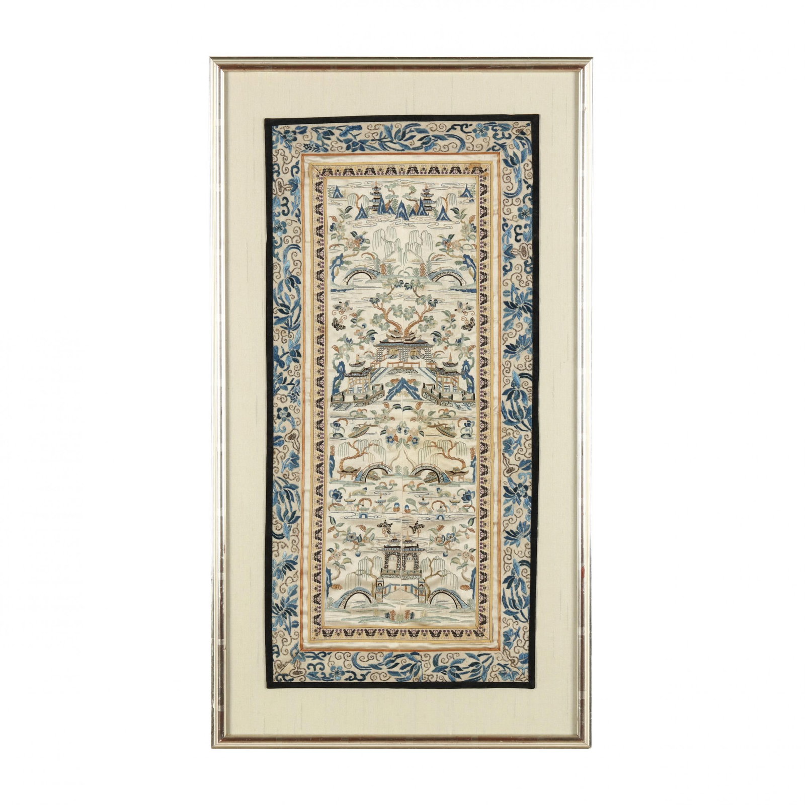 A Chinese Framed Embroidered Sleeve: A Chinese Framed Embroidered Sleeve Laet 19th or early 20th-century, silk embroidered in shades of blue, turquoise, green, and neutrals, depicting garden landscapes with foliate and butterfly motifs, 