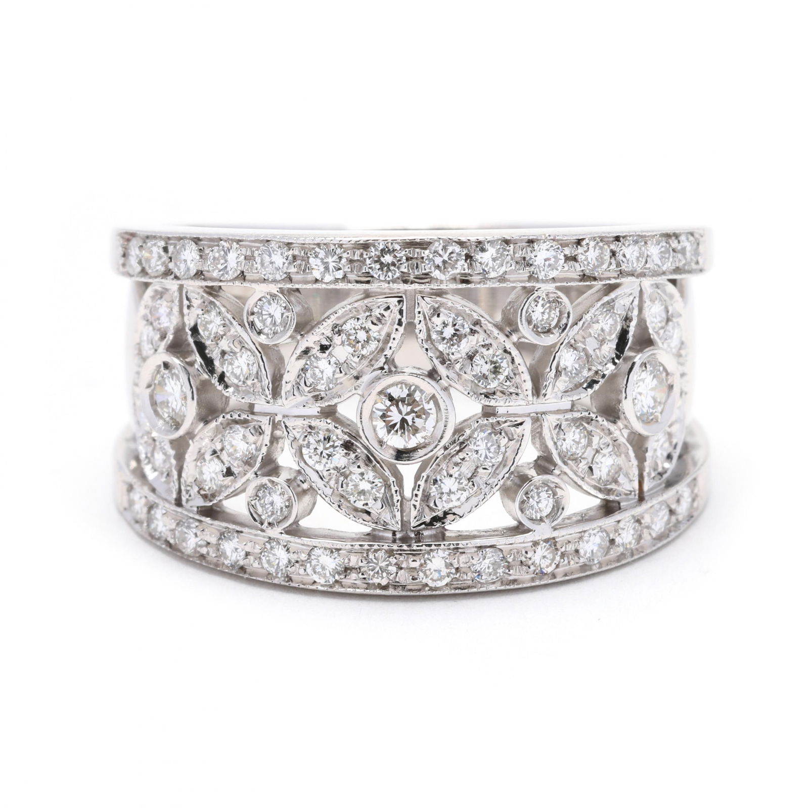 Gold and Diamond Reticulated Band, Chimento: Gold and Diamond Reticulated Band, Chimentothe reticulated tapered band in a rosette motif, set with full cut round diamonds weighing approximately 1.0 total carat (G-H color, SI1-I1 clarity), stamped
