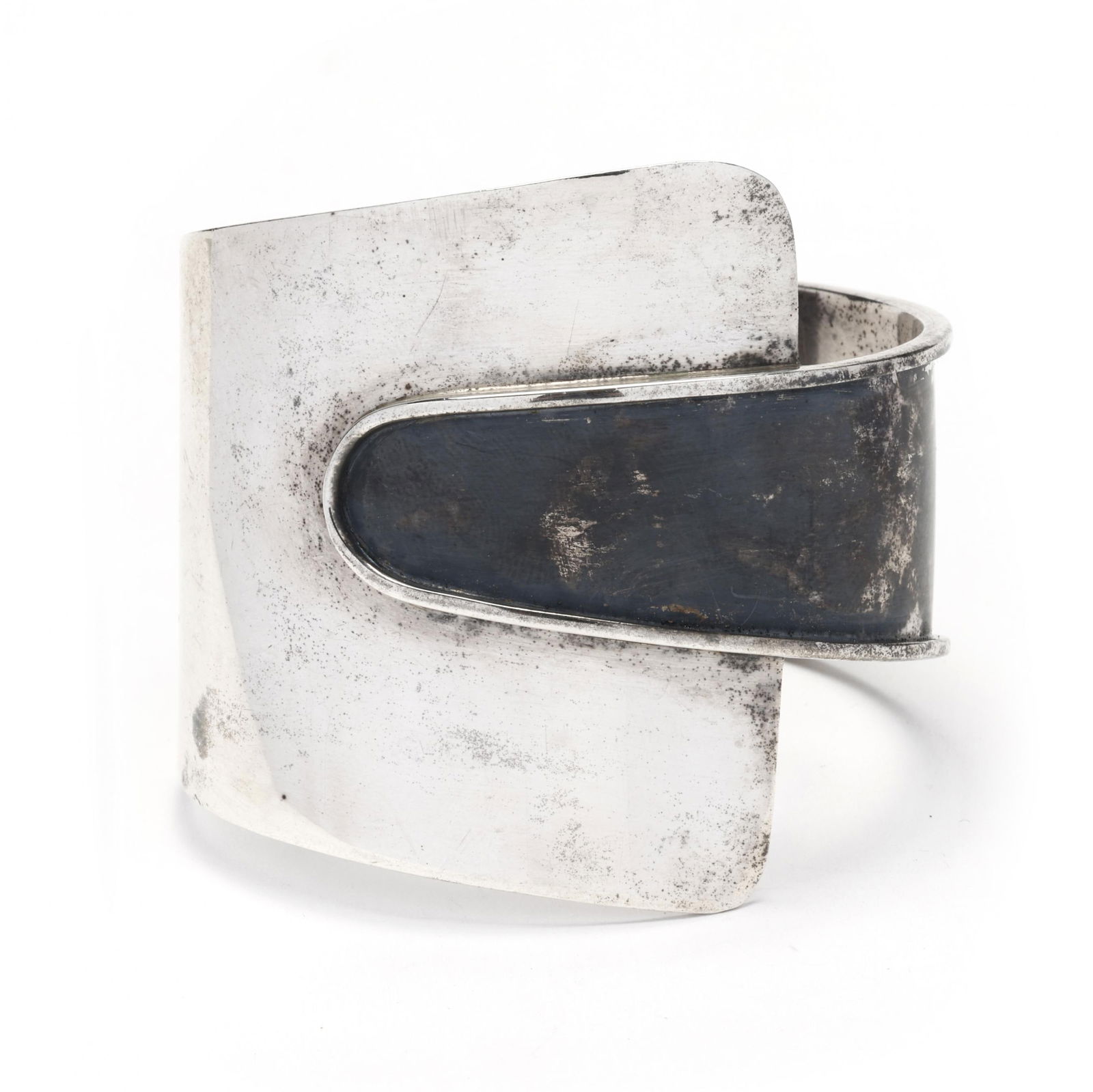 Modernist Sterling Silver Cuff Bracelet, Ed Wiener: Modernist Sterling Silver Cuff Bracelet, Ed Wienera cuff bracelet with overlapping geometric design, signed Ed Wiener / Sterling. Width 2 in. (widest); 7 in. circumference with 1.25 in. opening 1.895