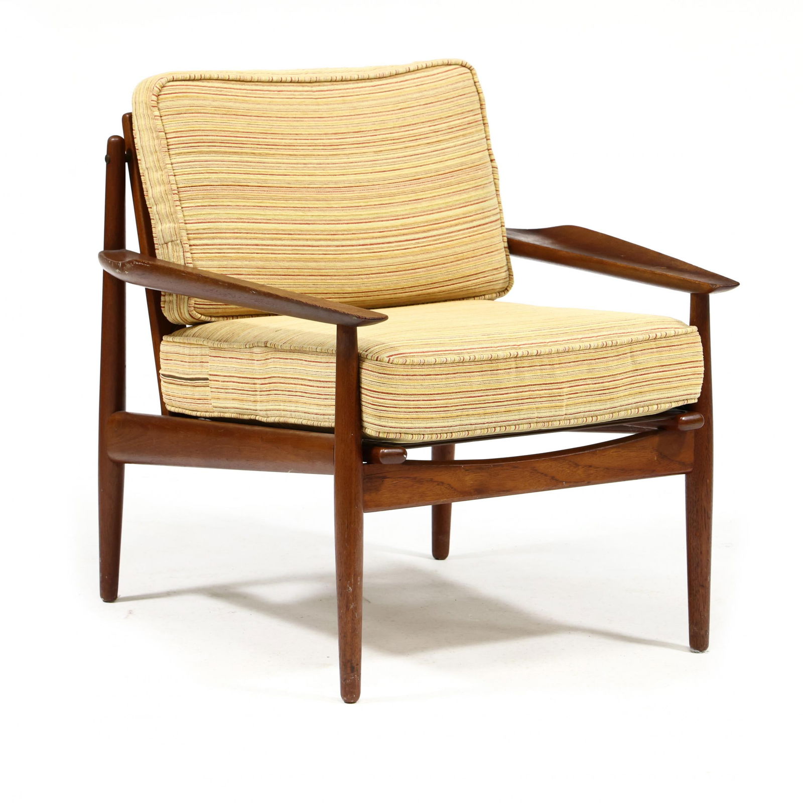 Arne Vodder (Denmark, 1926-2009), Teak Lounge Chair: Arne Vodder (Denmark, 1926-2009), Teak Lounge Chairfor Glostrup, 1960s, striped upholstered loose cushions with coil supports, shaped arms, rounded tapered legs, marked. 27.5 x 28.5 x 28.5 in. From th