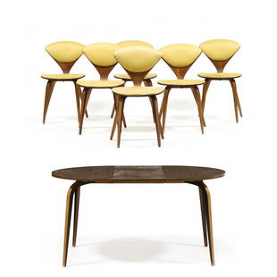 Norman Cherner (American, 1920-1987), Walnut Dining Table and Six Chairs: Norman Cherner (American, 1920-1987), Walnut Dining Table and Six Chairs1960s, for Plycraft, including a circular laminate top dining table with molded wood legs (29 x 41.5 in.), with one leaf (17 in.