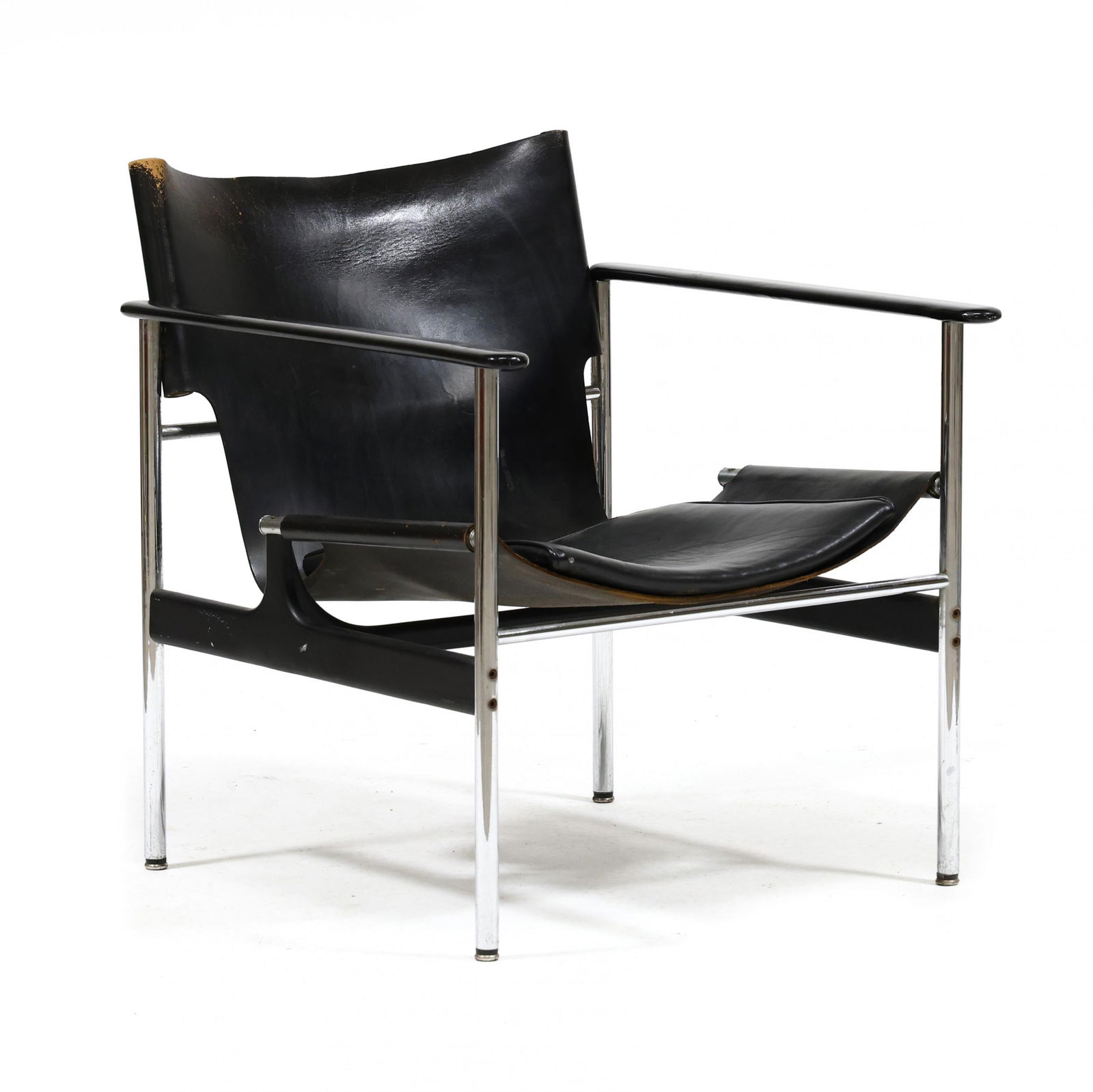Charles Pollock (American, 1902-1988), Leather Sling Armchair: Charles Pollock (American, 1902-1988), Leather Sling Armchair1960s, Knoll, black leather back and seat with padded cushion, black composition arms, black metal and polished steel frame, unmarked. 28 x