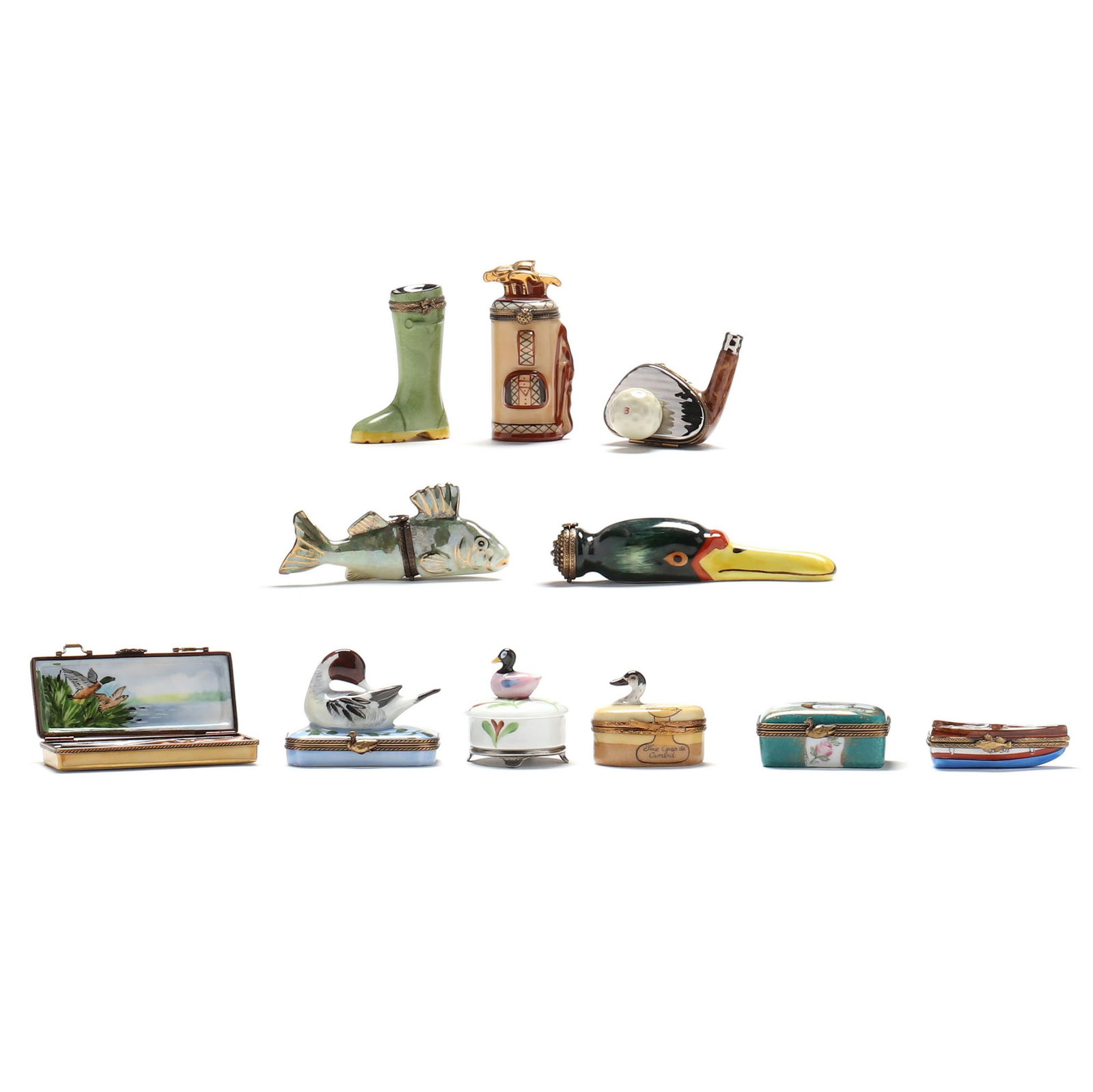 A Collection of Eleven Outdoor Sport Related Limoges Pill Boxes: A Collection of Eleven Outdoor Sport Related Limoges Pill Boxesto include: boots, a fish, rifles in a case, (5) with waterfowl, a fishing boat, (2) golf club themed. Tallest Boots 3 in. Private Collec
