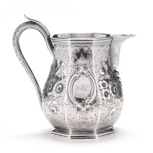 A Coin Silver Milk Pitcher, Mark of William Forbes for Ball, Tompkins & Black: A Coin Silver Milk Pitcher, Mark of William Forbes for Ball, Tompkins & Blackcirca 1839-1851, New York, marked "Successors To / Marquand & Co", a faceted octagonal footed form with allover hand chased