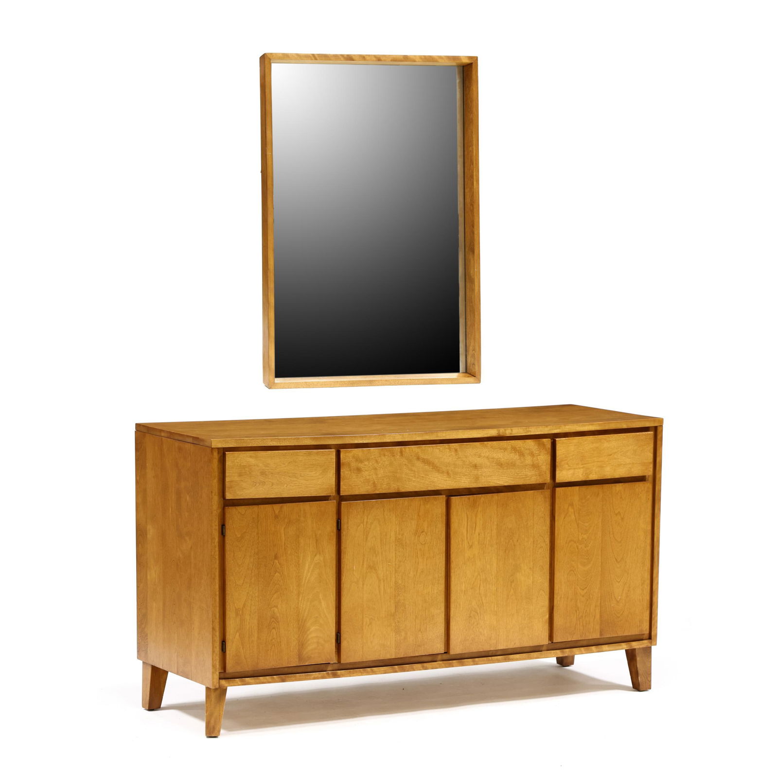 Russel Wright (American, 1904-1976), Mid-Century Maple Sideboard and Mirror: Russel Wright (American, 1904-1976), Mid-Century Maple Sideboard and Mirror1950s, for Conant Ball, including a shadow-box rectangular mirror (32 x 42 in.); together with a sideboard with three drawers