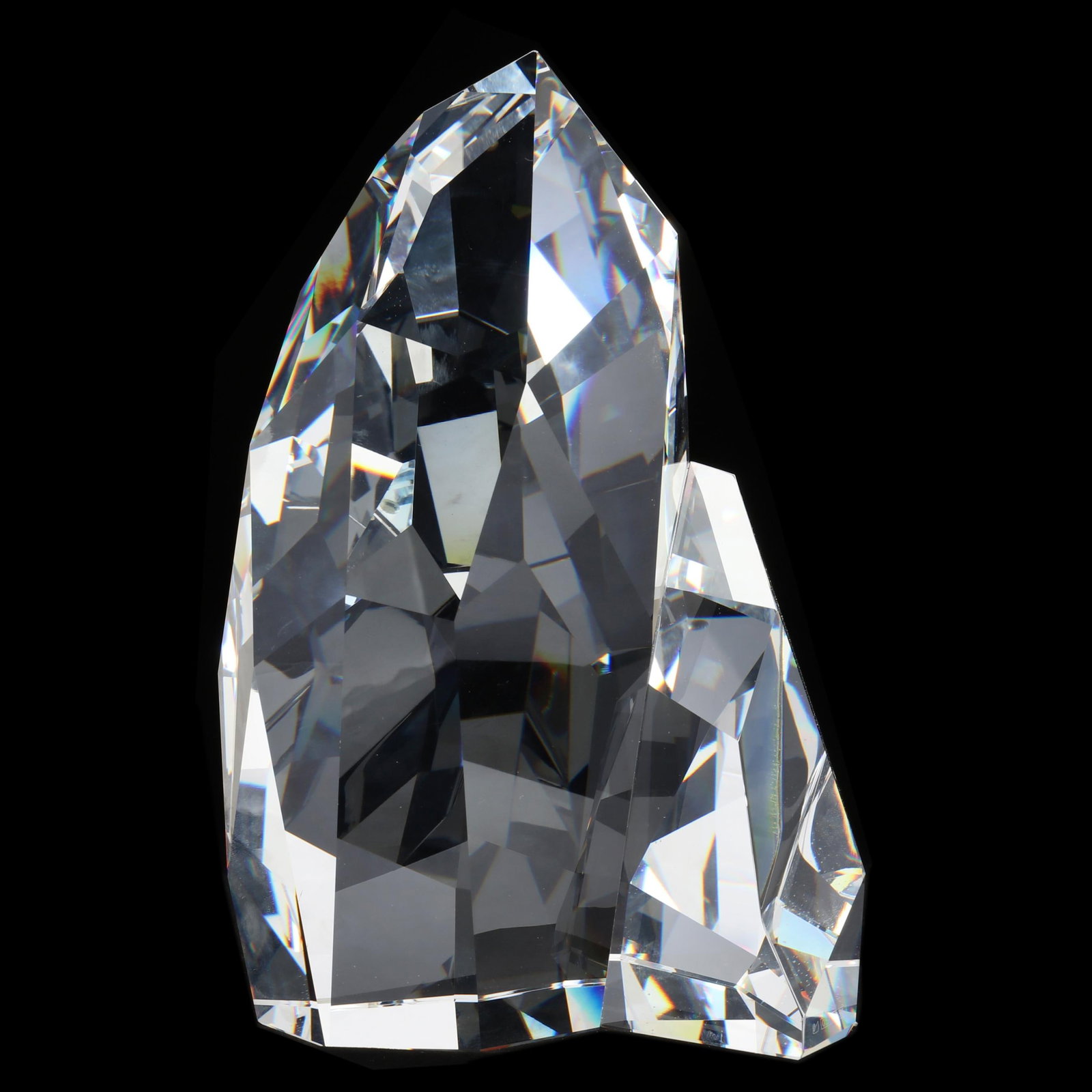 Mario Dilitz (Austrian, b. 1973) for Swarovski, Iluliac Iceberg Sculpture: Mario Dilitz (Austrian, b. 1973) for Swarovski, Iluliac Iceberg Sculpture clear faceted crystal, a limited edition issued in 2005, discontinued in 2008, item number 837625, marked at base. 9 7/8 x 6 x
