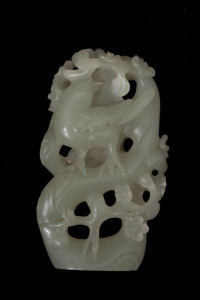 Chinese Jade Carving: Chinese Jade Carvingof celadon tones, a pierced relief carving of a magpie perched in the branches of a flowering plum tree.3.25 in.Collection of Frank Doonan, Hillsborough, NC This lot was purchased