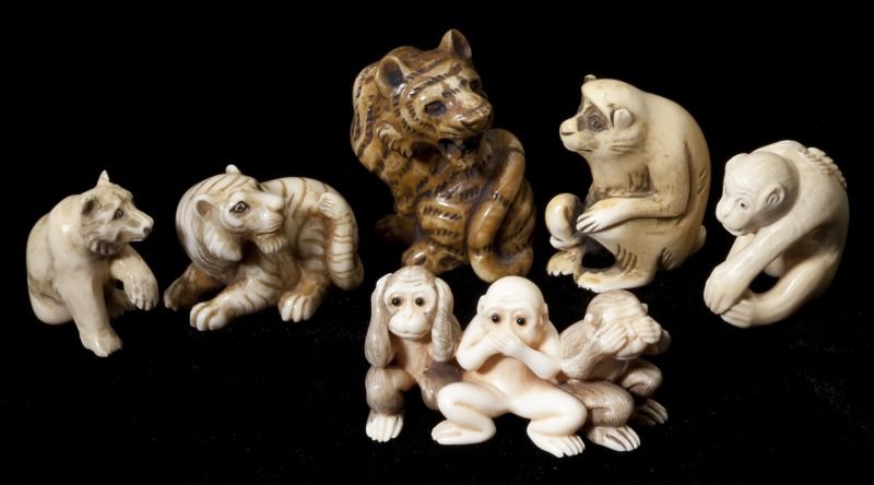 Group of Ivory Netsuke Monkeys and Tigers: Group of Ivory Netsuke Monkeys and Tigers six pieces total, all signed, some with toned detail. 1 in. to 1.75 in. Estate of Dennis Patrick, MI