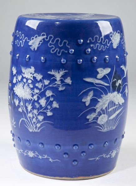 Chinese Porcelain Garden Stool: Chinese Porcelain Garden Stool circa 1900, blue field with avian and floral design painted in white, pierced sides and top, with bosses. 18.75 x 13 in. Private Collection, Raleigh, NC