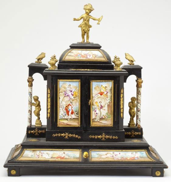 Viennese Enameled Table Top Cabinet: Viennese Enameled Table Top Cabinetlate 19th century, the ebonized case set with a multitude of hand-painted enamel plaques featuring mythological scenes, the lower plinth with long drawer above with