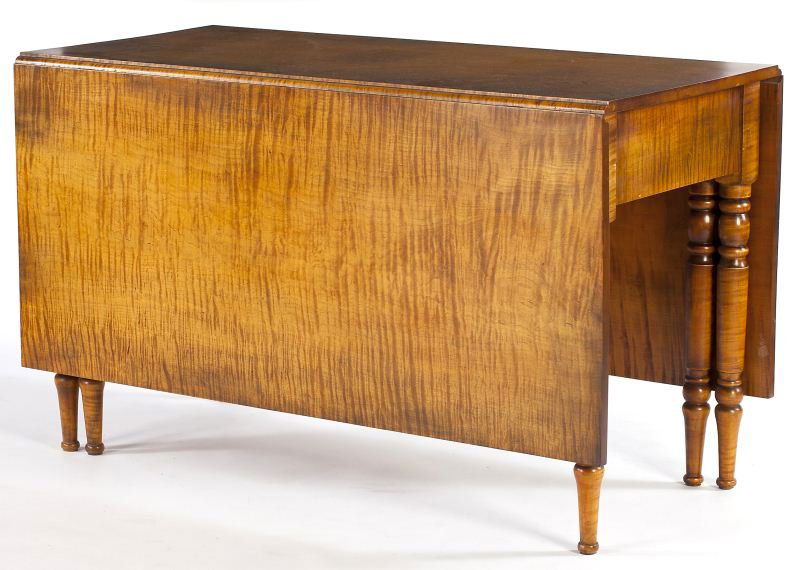 Custom Sheraton Style Tiger Maple Dining Table: Custom Sheraton Style Tiger Maple Dining TableAmerican, 20th century, nicely figured grain, the large rectangular drop leaves are supported by swing turned legs.29 x 48 x 21 in.; each leaf 21.75 in.