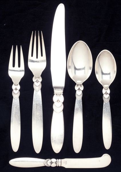 Georg Jensen "Cactus" Sterling Silver Flatware: Georg Jensen "Cactus" Sterling Silver Flatware (24) pieces, four (6) piece place settings including: (4) knives (9 in.); (4) forks (7.25 in.); (4) salad forks (6 3/8 in.); (4) dessert / oval soup spoo