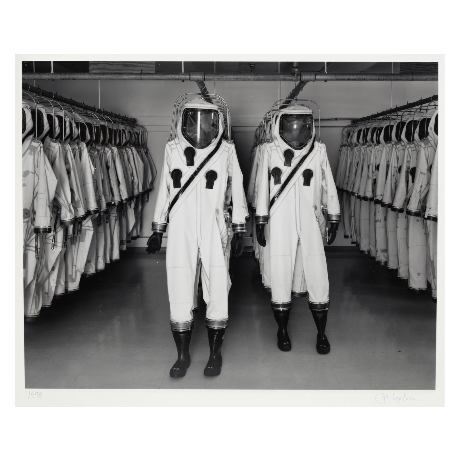 John Sexton (American, b. 1953), SCAPE Suits, Kennedy Space Center, FL: John Sexton (American, b. 1953), SCAPE Suits, Kennedy Space Center, FLgelatin silver print, 1998, printed 2021, pencil signed and dated to mount, also with photographer's ink stamp and inscription to