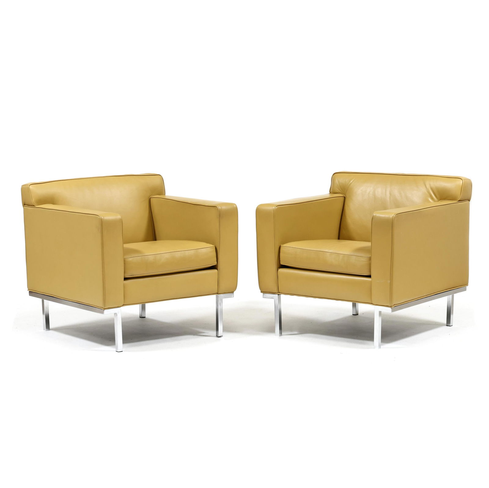 Design Within Reach, Pair of Theatre Leather Club Chairs: Design Within Reach, Pair of Theatre Leather Club Chairscontemporary, designed by Ted Boerner, camel colored leather, single velcro seat cushion, polished steel tubular legs, labeled. 30.5 x 31.25 x 3