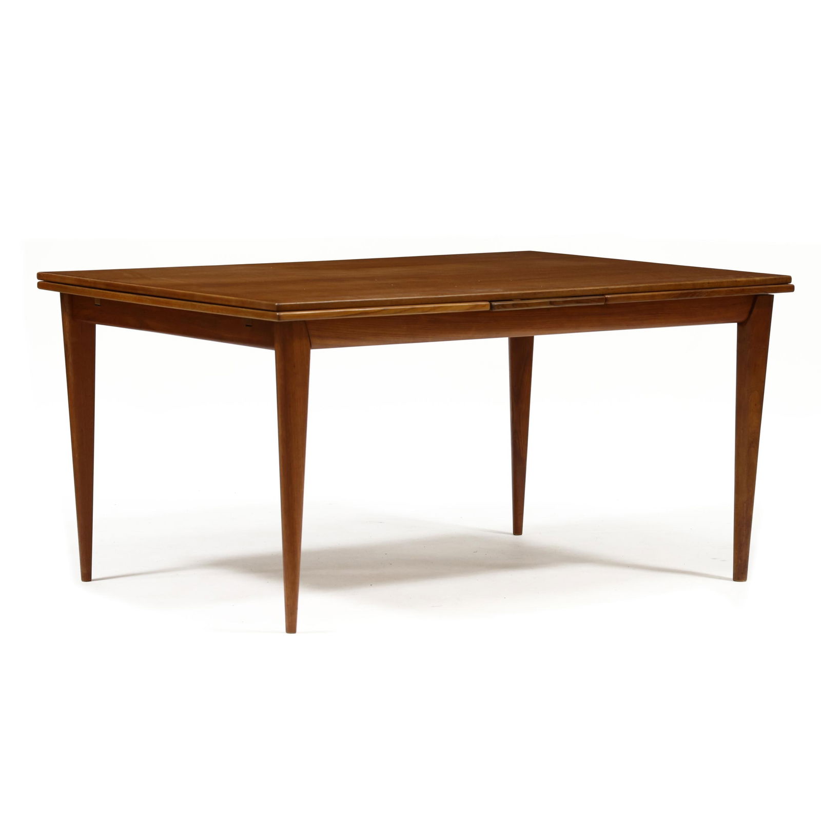 Niels Otto Møller (Denmark, 1920-1982), Model 12 Teak Extension Dining Table: Niels Otto Møller (Denmark, 1920-1982), Model 12 Teak Extension Dining Table1960s, teak and teak veneer, rectangular top with banded edge, two draw leaves (23 in. each), rounded tapered legs. 29 x 39