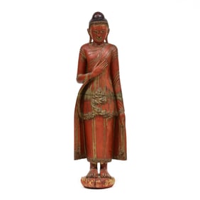 A Large Red Lacquered Sculpture of a Standing Buddha