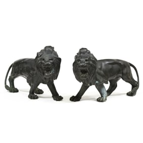 An Impressive Pair of Large Patinated Bronze Lion Statues