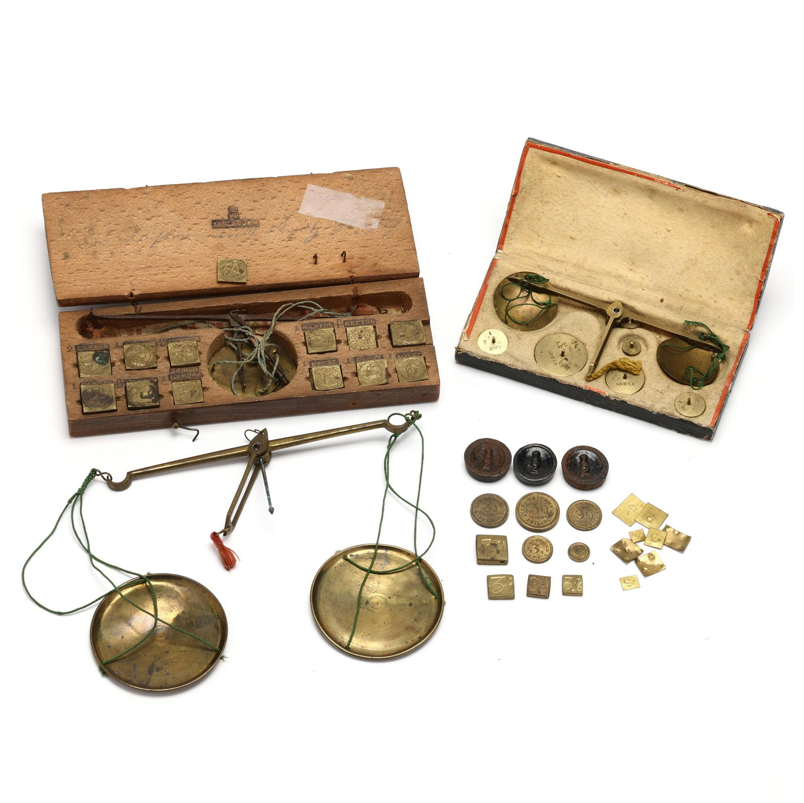 Three Antique Pocket Merchant Scales: Three Antique Pocket Merchant Scalesthe first a German coin scale, circa 1800, the scale with steel beam and two circular brass pans, and (13) square grain weights, all fitted within a wood case, the