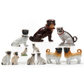 A Group of Eleven Ceramic Pug Dogs