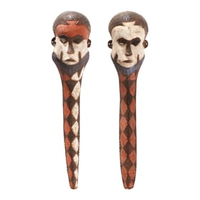 A Pair of Large African Carved and Polychrome Masks