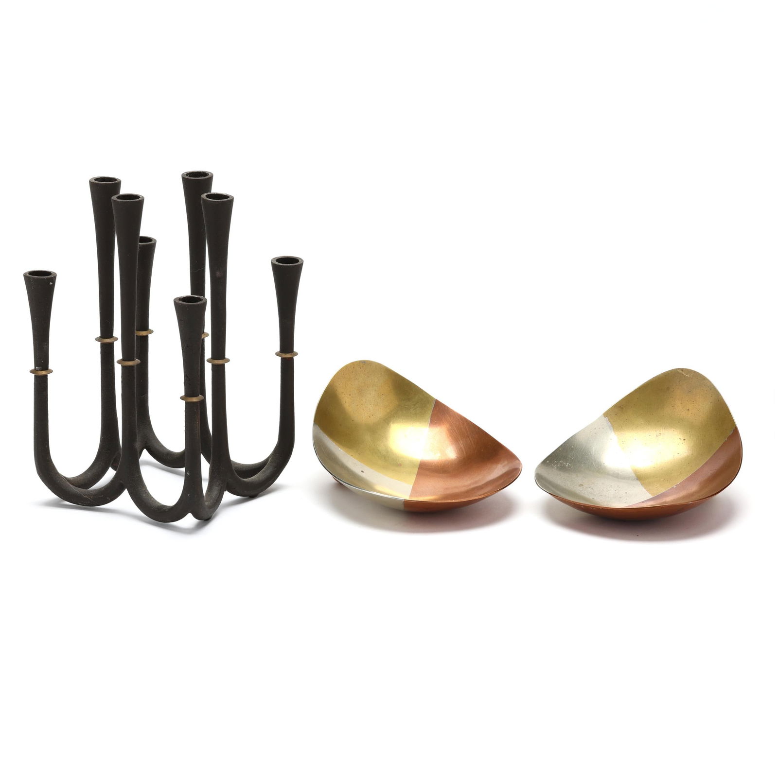 A Grouping of Mid-Century Mixed Metals Table Accessories: A Grouping of Mid-Century Mixed Metals Table Accessoriesto include a Jens Quistgaard for Dansk eight-light candle holder, crafted in iron and brass, worn marks to underside (7 x 4 1/2 x 4 1/2 in.); to