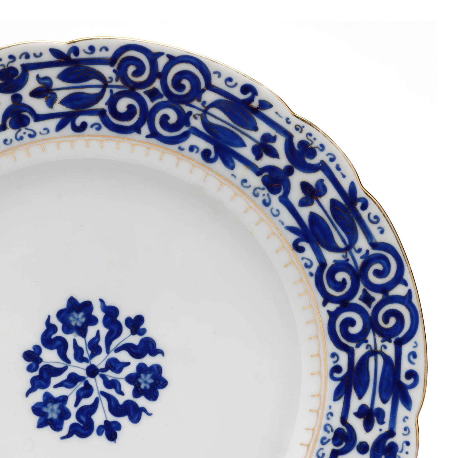 Two Sets of Cobalt and Gilt Porcelain Plates: Two Sets of Cobalt and Gilt Porcelain Platesfirst half of 20th century includes a set of (8) Spode plates with cobalt and raised gilt borders with bead enamel decorated rim (10 1/4 in. dia.); and (10)