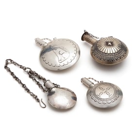 Four Navajo Stamped Silver Tobacco Canteens