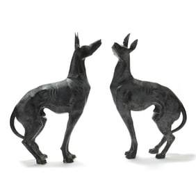 A Large Pair of Patinated Bronze Canine Statues