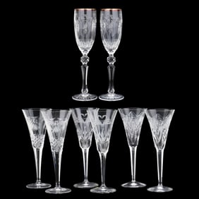 Eight Assorted Waterford Crystal Champagne Flutes