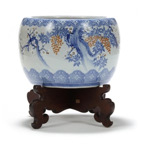 A Japanese Porcelain Jardiniere on Stand