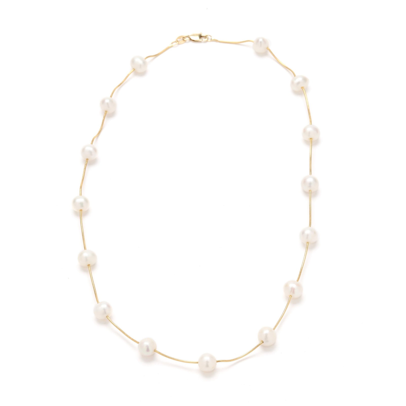 Gold and Pearl Station Necklace: Gold and Pearl Station Necklace the fine link snake chain with (15) cultured pearl stations (7mm) and completed with a lobster clasp stamped 14K / RTI. 16 in. 6.2 dwt. Additional high-resolution photo