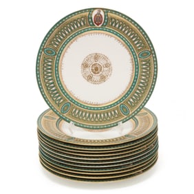 Set of Twelve Gilt-Decorated Dinner Plates with Family Crest