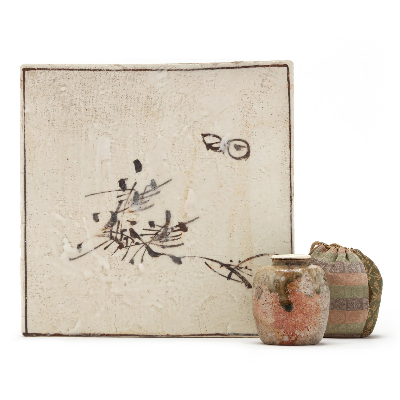 A Japanese Tray for Tea Kettle ( Shikigawara ) and Tea Caddy ( Chaire ): A Japanese Tray for Tea Kettle (Shikigawara) and Tea Caddy (Chaire)20th century, includes a tray for tea kettle (shikigawara), stoneware, this ceramic surface would have been placed immediately beneat