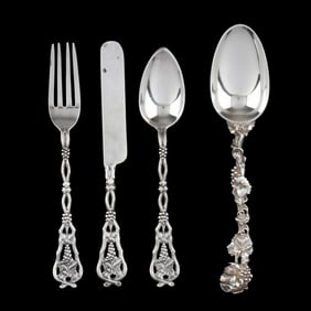 Four Pieces of American Silver Flatware in a Grape and Vine Pattern