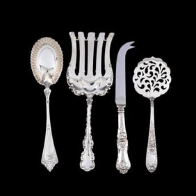 Four Silver Flatware Servers