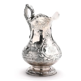 A Large Coin Silver 'Landscape' Pitcher by Bailey & Co.