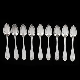Nine American Coin Silver Citrus Spoons, retailed by Adler & Myers