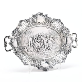 A German Silver Repousse Dish with Figures