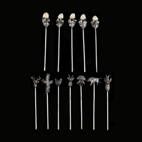 Set of Twelve Austrian Silver Hunt Themed Picks